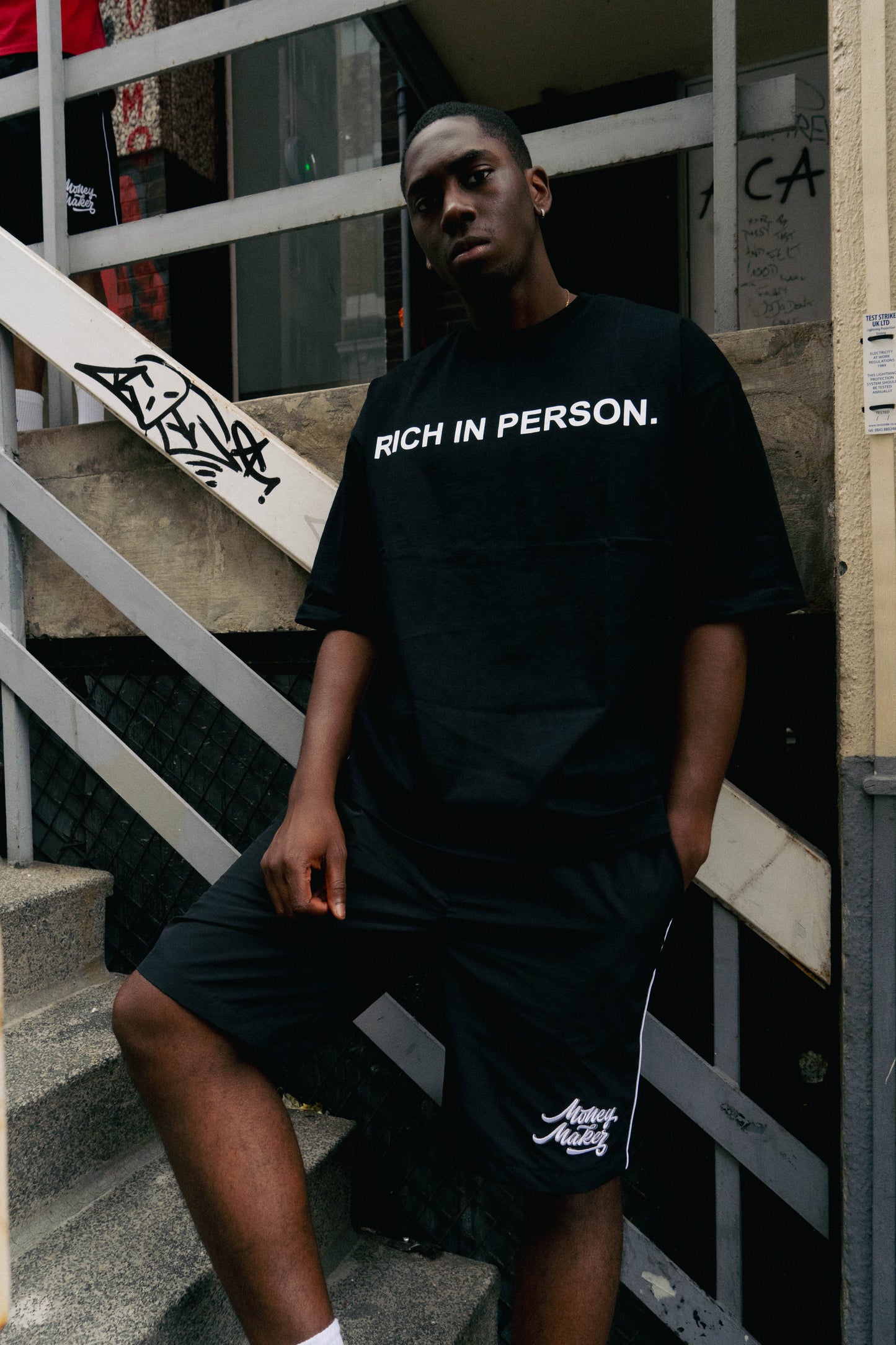 "RICH IN PERSON " Black Oversized T-Shirt